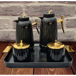 A set of thermos with a tray and 2 sugar bowls in black